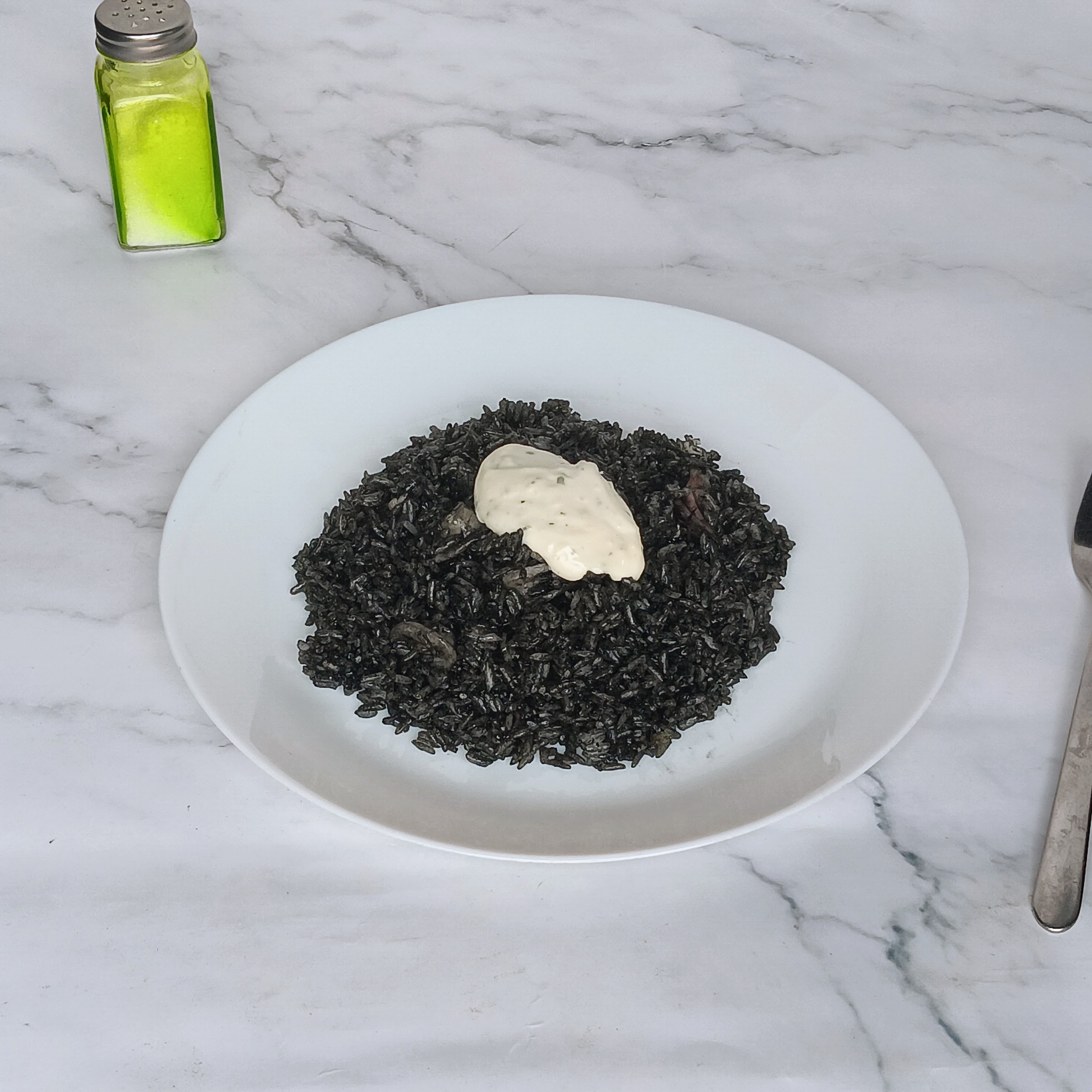 Arroz negro con chipirones